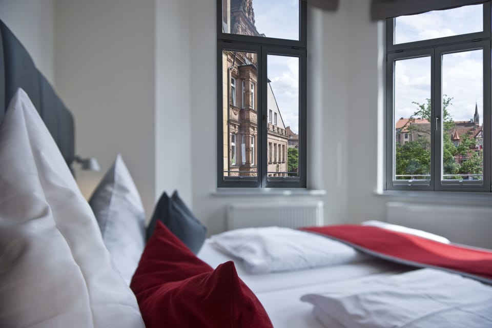 Premium bedding, blackout drapes, soundproofing, iron/ironing board