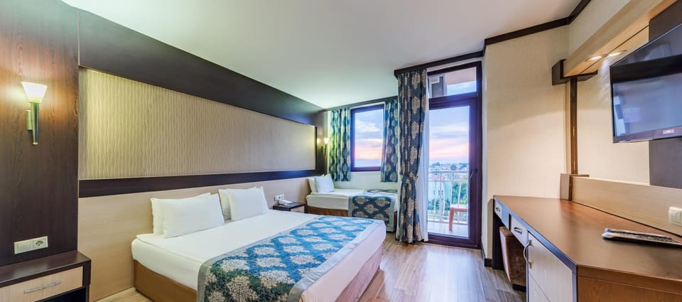 Premium bedding, desk, laptop workspace, soundproofing