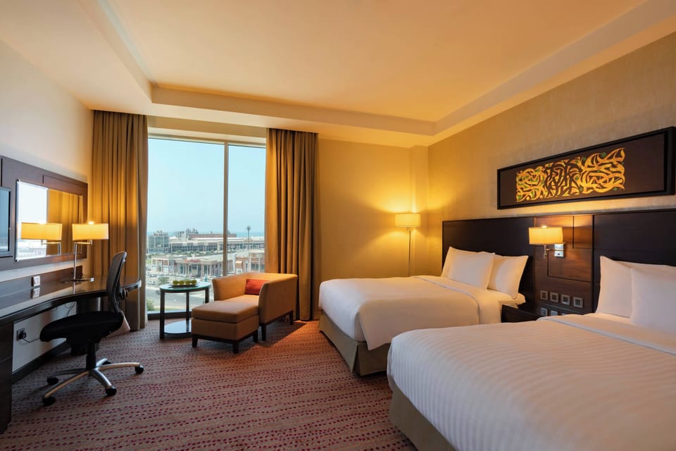 Deluxe Room, 2 Double Beds | Down comforters, pillowtop beds, in-room safe, individually decorated