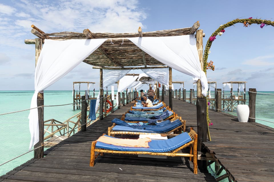 Private beach, white sand, sun loungers, beach umbrellas