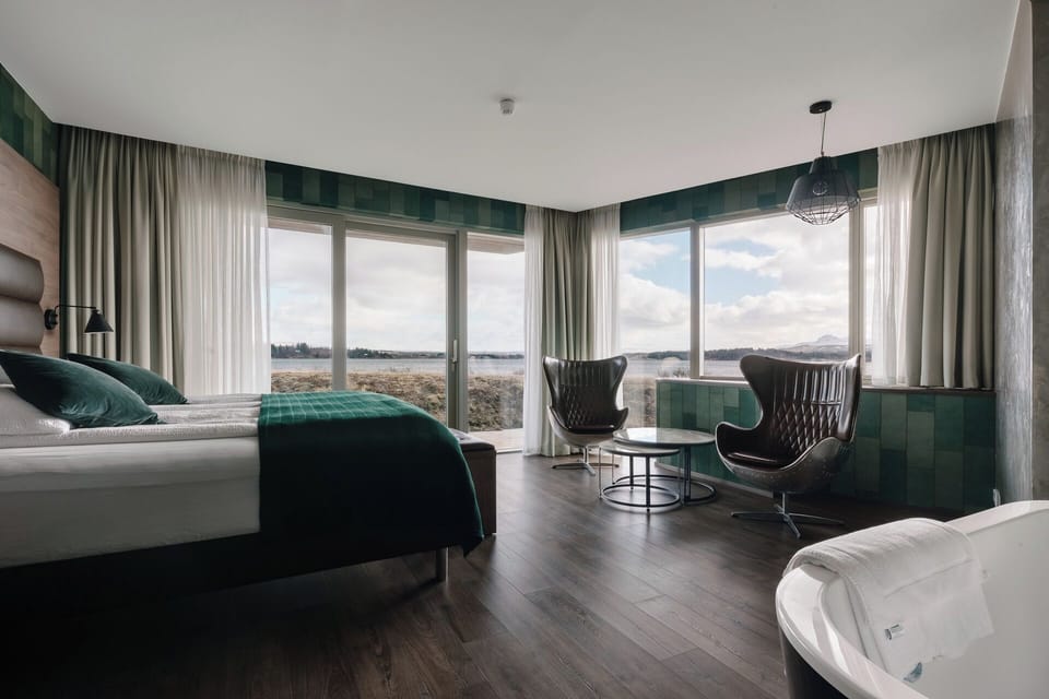 Panoramic Suite, Lake View, Corner | Desk, laptop workspace, blackout drapes, iron/ironing board (on request)