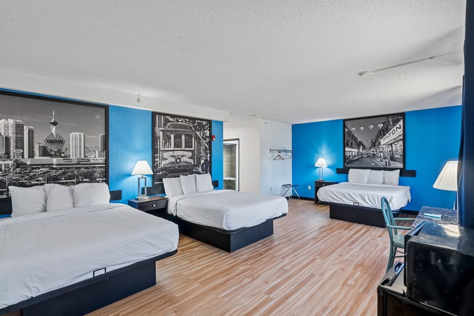 Family Room 3 Queen Beds Oversized Non Smoking  | Desk, laptop workspace, blackout drapes, iron/ironing board