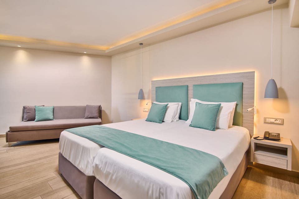 Comfort Room, Pool View | In-room safe, desk, iron/ironing board, free WiFi