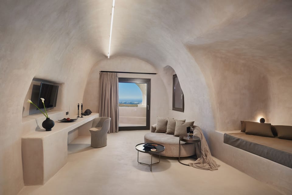 Elysium Cave Suite with Jetted Tub, Caldera View | Living area | 42-inch Smart TV with satellite channels, TV
