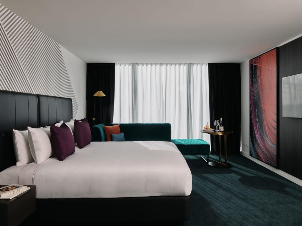 Deluxe Room, 1 King Bed | Premium bedding, minibar, in-room safe, individually decorated