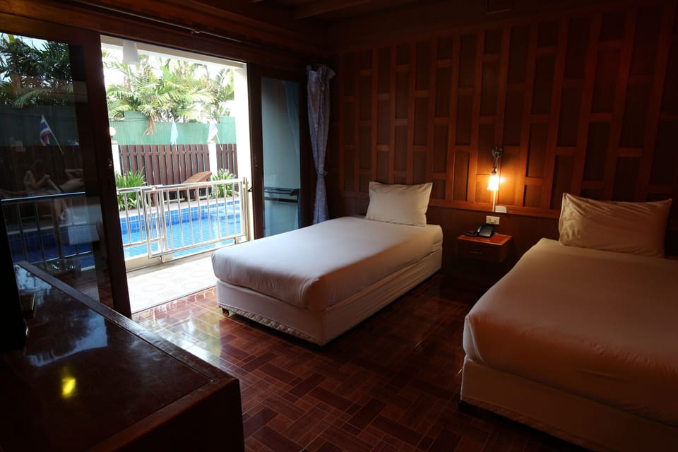 Deluxe Twin Room, Pool Access | In-room safe, free WiFi