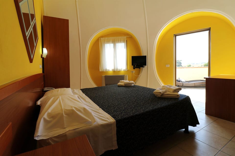 Superior Quadruple Room | Hypo-allergenic bedding available, minibar, desk, laptop workspace