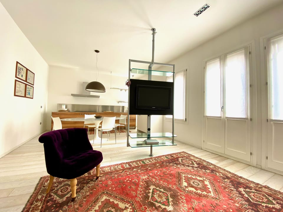Design Apartment | Living area | Flat-screen TV
