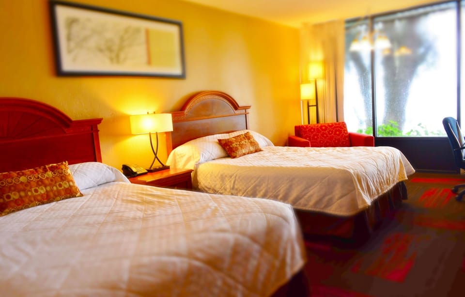 Premium bedding, pillowtop beds, desk, blackout drapes