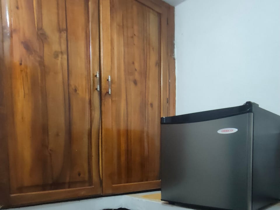 Deluxe Room, Garden View, Ground Floor | Mini-refrigerator