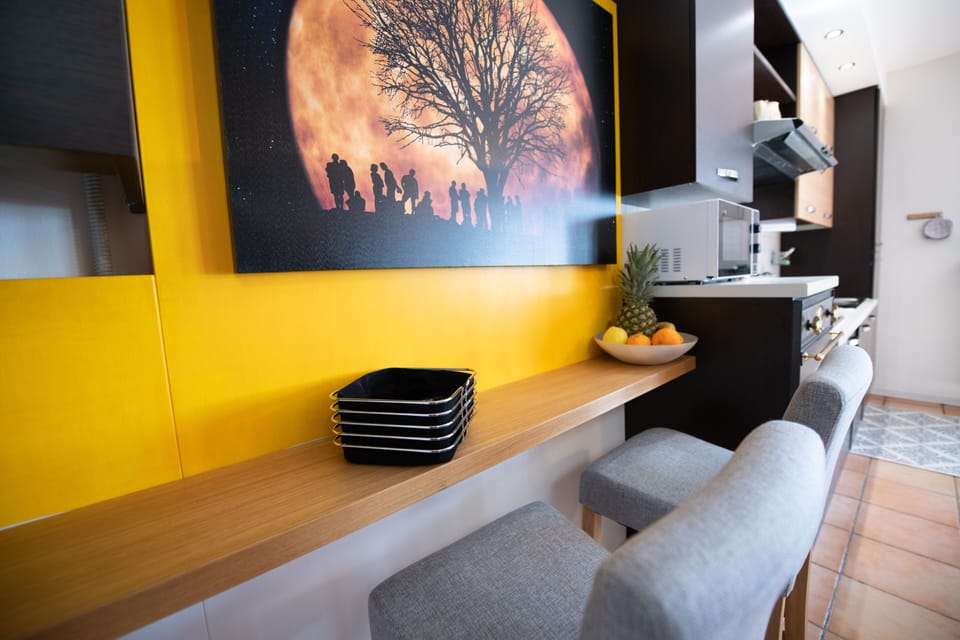 Classic Apartment | Living area | 50-inch TV with cable channels