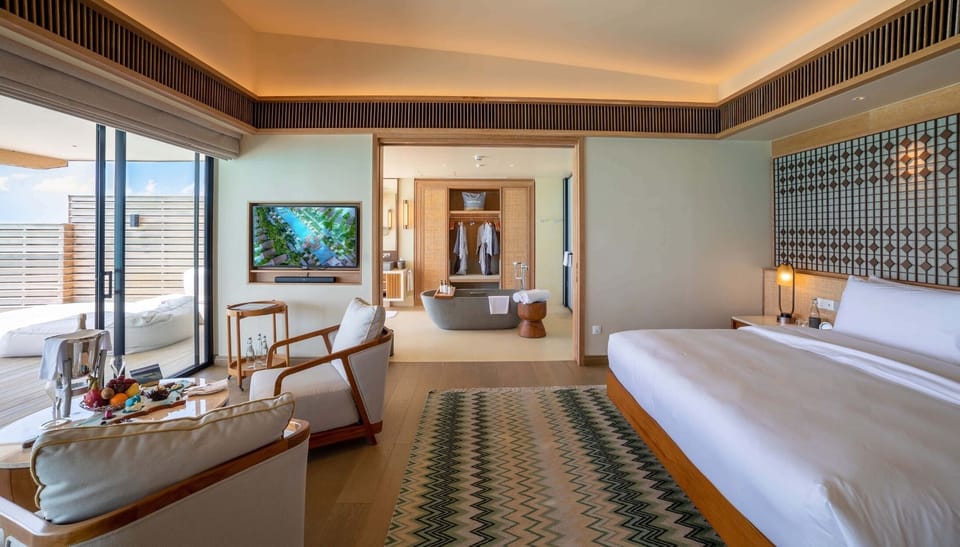 Sunset Water Villa with Private Pool | Premium bedding, Tempur-Pedic beds, minibar, in-room safe