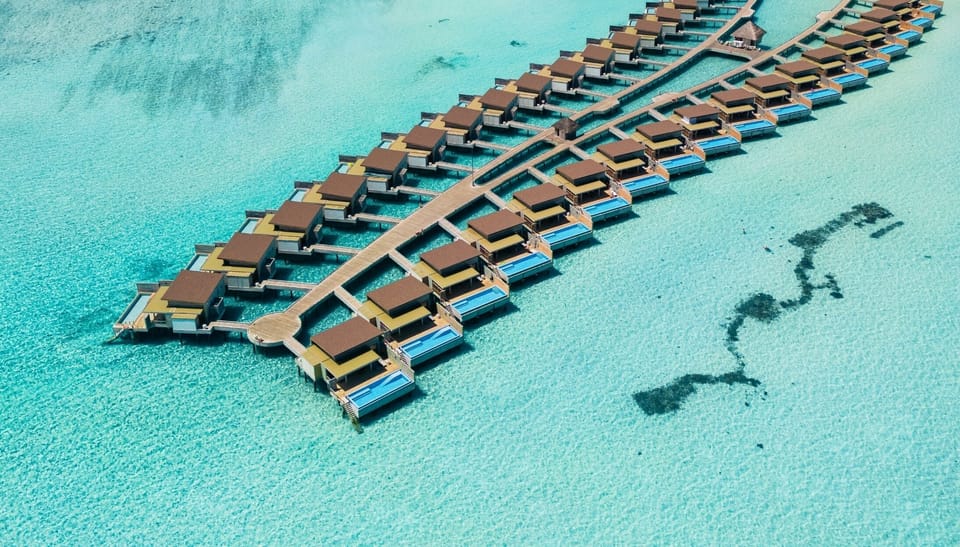 Sunset Water Villa with Private Pool | Premium bedding, Tempur-Pedic beds, minibar, in-room safe