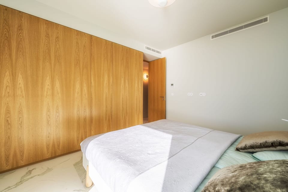 Panoramic Apartment, 2 Bedrooms, Sea View | 2 bedrooms, individually decorated, laptop workspace, iron/ironing board