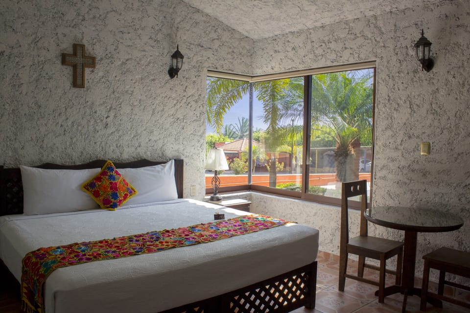 Basic Bungalow, 2 Bedrooms, Kitchenette | Iron/ironing board (on request), WiFi (free), bed sheets