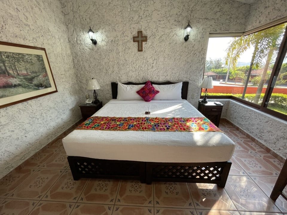 Basic Bungalow, 2 Bedrooms, Kitchenette | Iron/ironing board (on request), WiFi (free), bed sheets