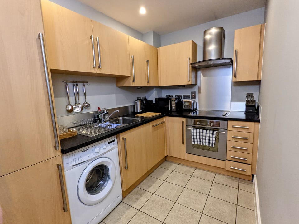 City Apartment, Private Bathroom | Private kitchen | Highchair
