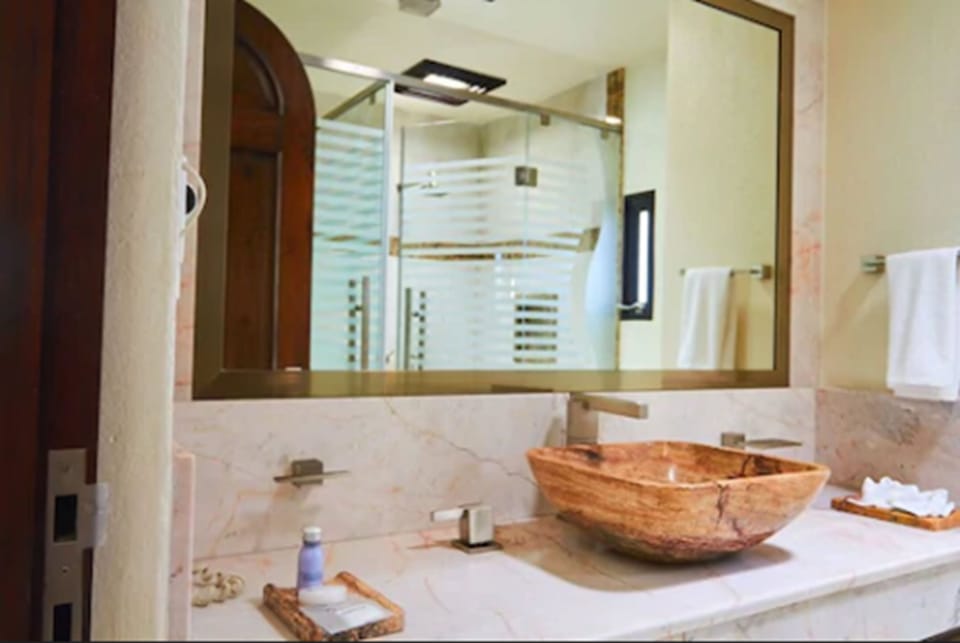 Shower, rainfall showerhead, hair dryer, towels