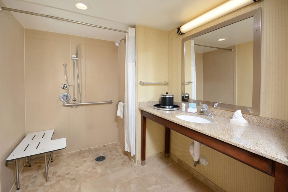 Room, 2 Queen Beds, Accessible (Mobility & Hearing, Roll-in Shower) | Bathroom | Combined shower/tub, hydromassage showerhead, designer toiletries