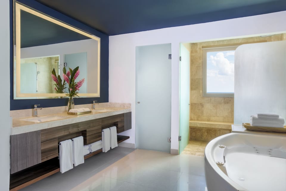 Separate tub and shower, jetted tub, rainfall showerhead