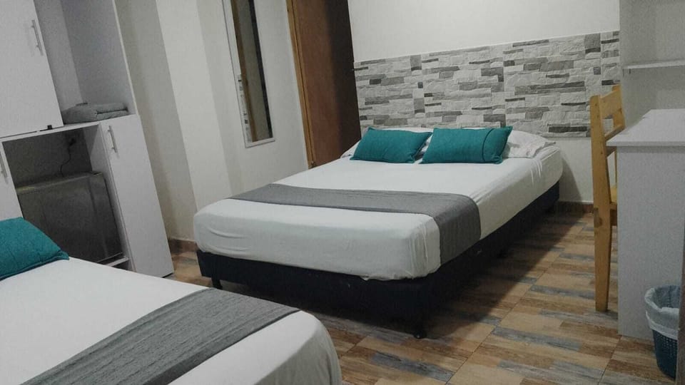 Standard Triple Room | Desk, laptop workspace, iron/ironing board (on request), travel crib