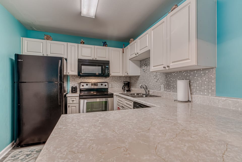 Condo, 2 Bedrooms | Private kitchen | Fridge, microwave, oven, dishwasher