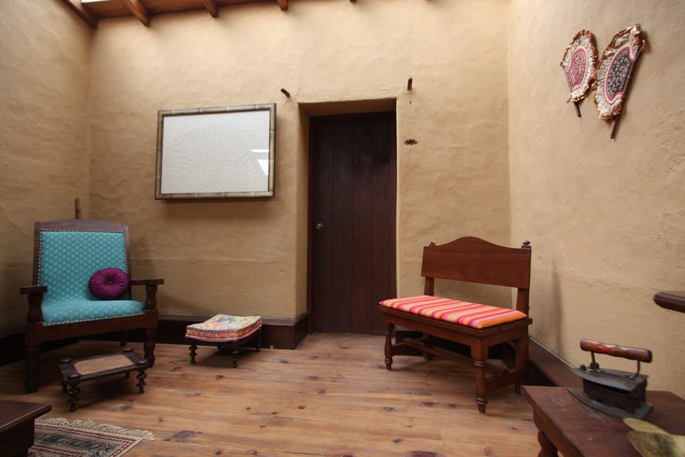 Deluxe Double Room | Living area | Flat-screen TV