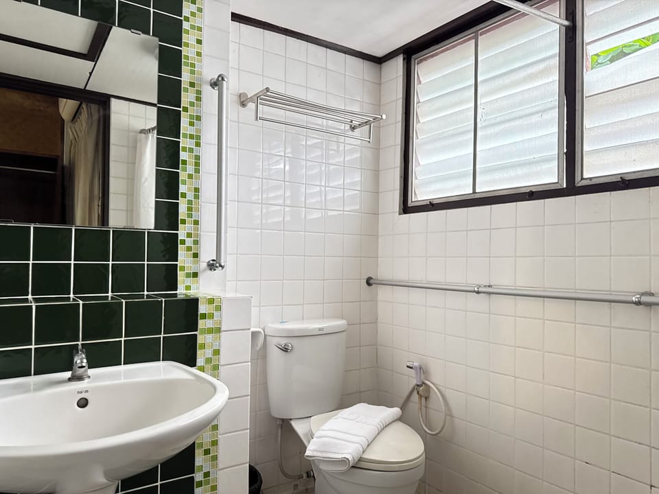 Superior Twin | Bathroom | Shower, free toiletries, towels, soap