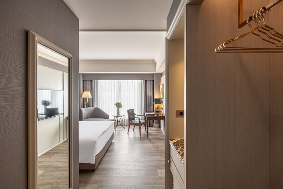 Classic King Room | Down comforters, minibar, blackout drapes, iron/ironing board