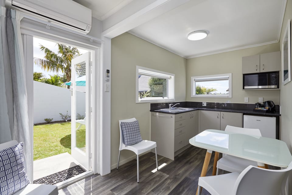 Superior 1 Bedroom | Private kitchenette | Full-size fridge, microwave, stovetop, coffee/tea maker