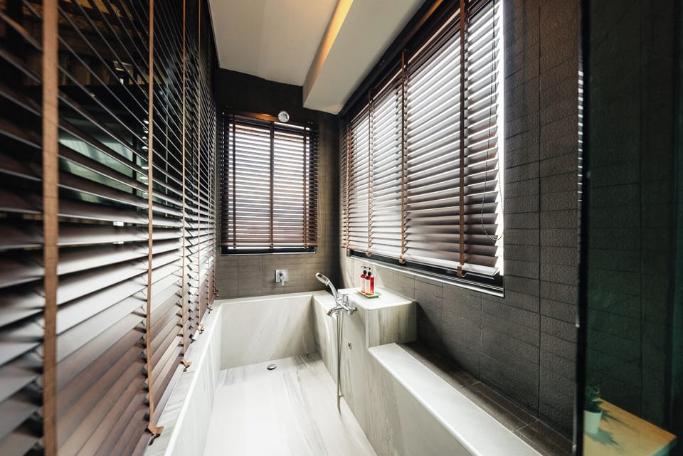 Oriental Suite | Bathroom | Hair dryer, slippers, towels, soap