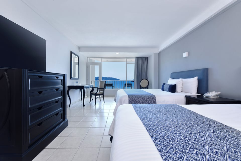 Standard Ocean View | Down comforters, in-room safe, blackout drapes, iron/ironing board