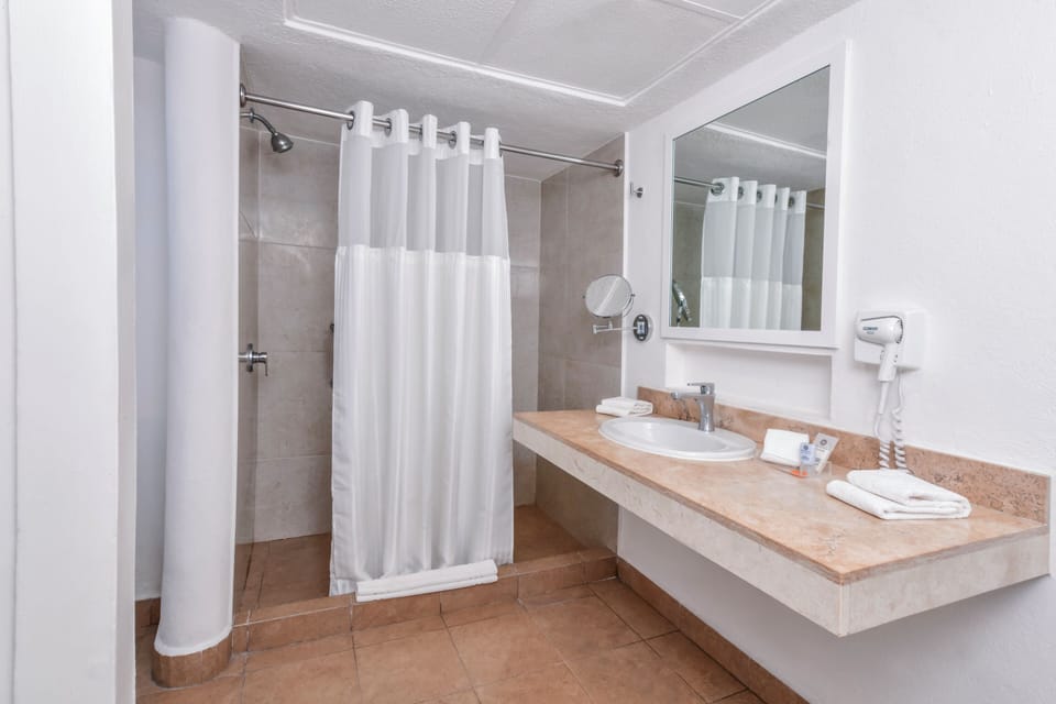 Shower, free toiletries, hair dryer, towels