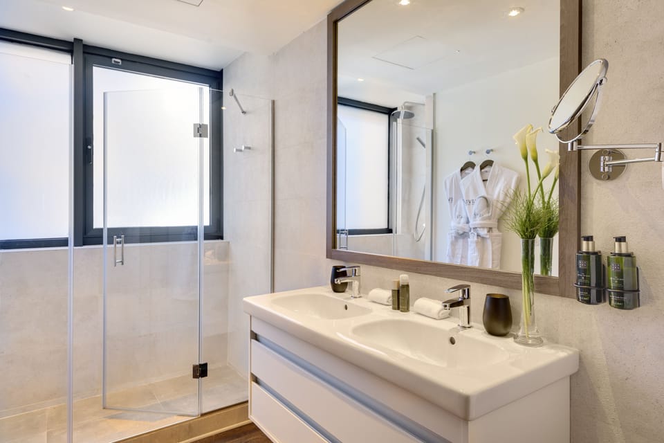 Eco-friendly toiletries, hair dryer, towels, soap
