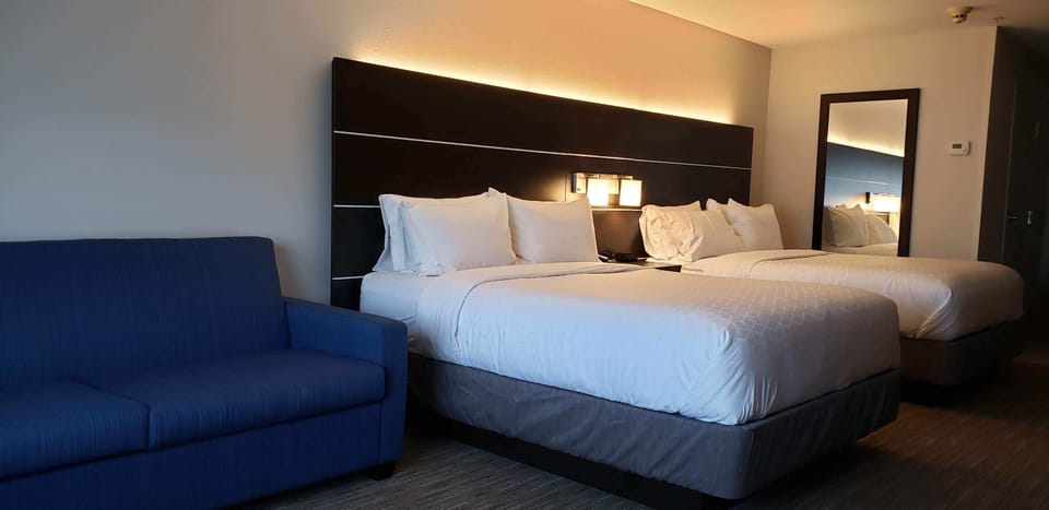 Suite, Multiple Beds (Additional Living) | Premium bedding, in-room safe, desk, laptop workspace