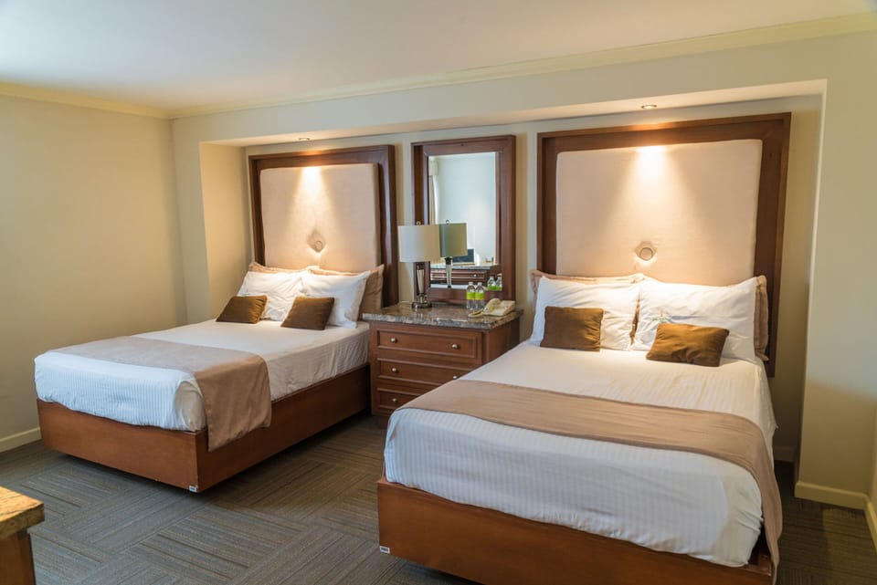 Executive Double Room | Minibar, laptop workspace, blackout drapes