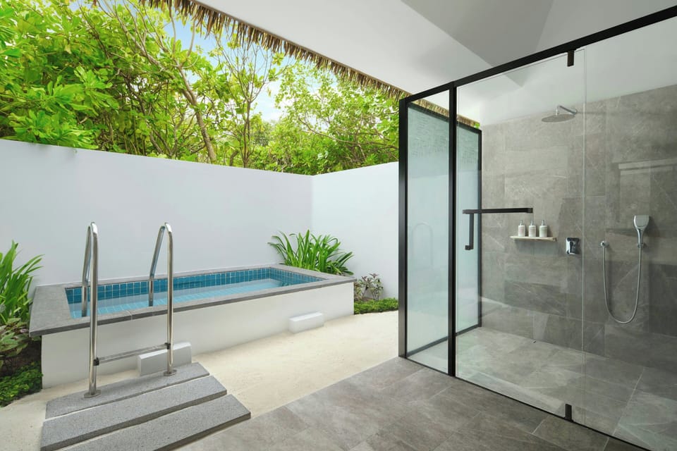 1 Bedroom, Beach Garden Pool Villa | Bathroom | Eco-friendly toiletries, hair dryer, bathrobes, slippers