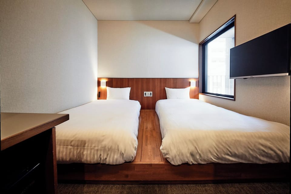 Standard Twin Room, Non Smoking | Individually decorated, laptop workspace, iron/ironing board, free WiFi