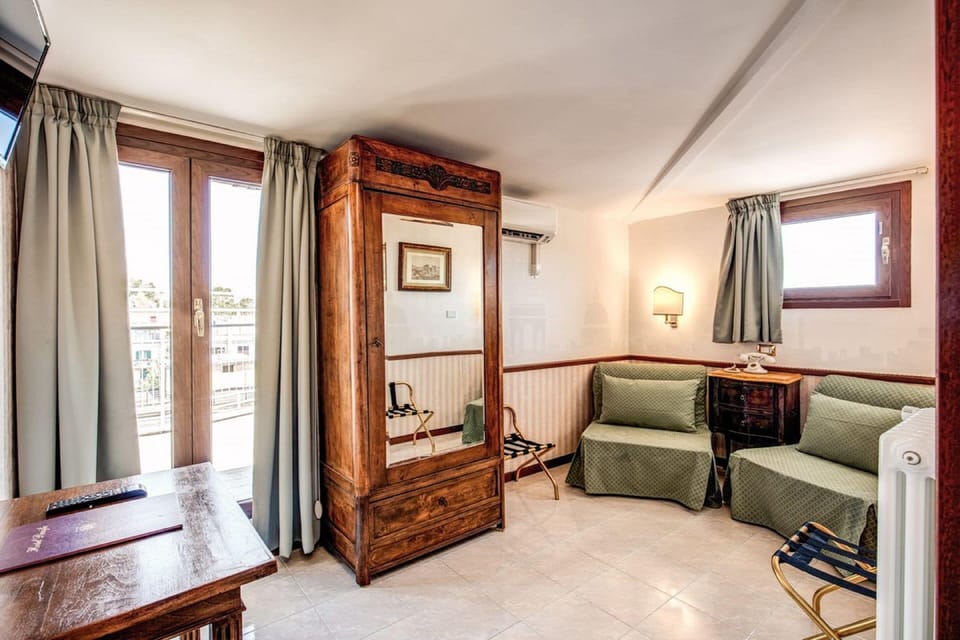Junior Suite, Terrace | Living area | Flat-screen TV