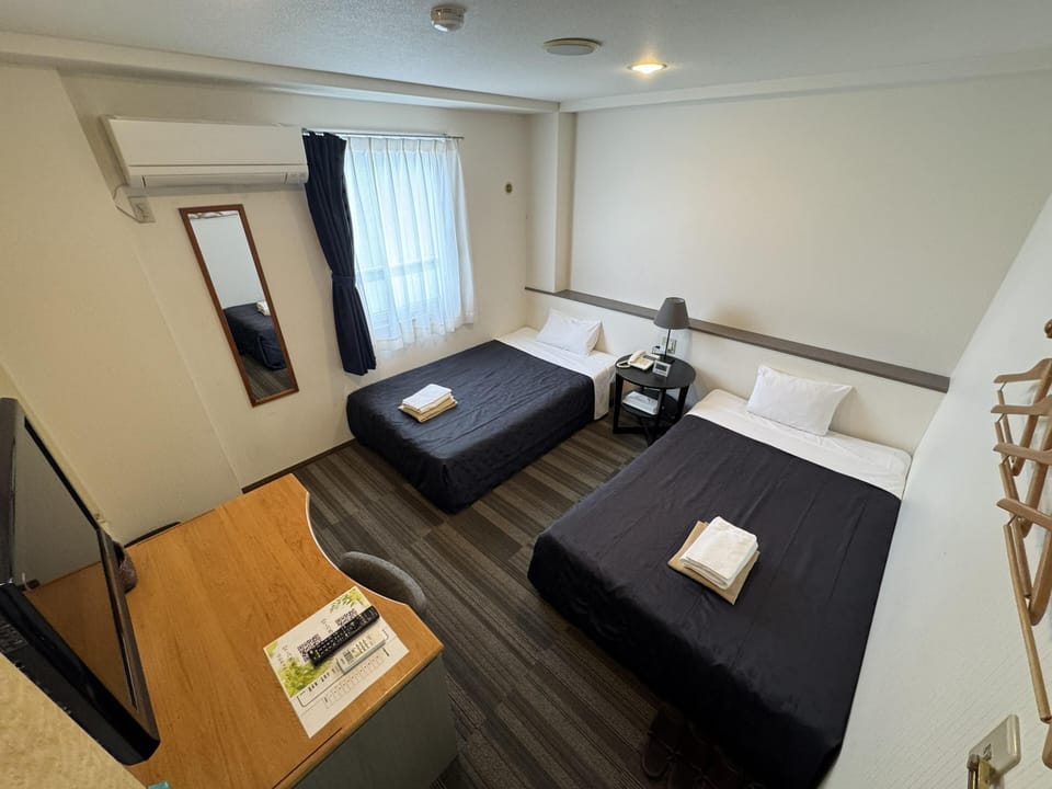 Desk, laptop workspace, WiFi (free), bed sheets