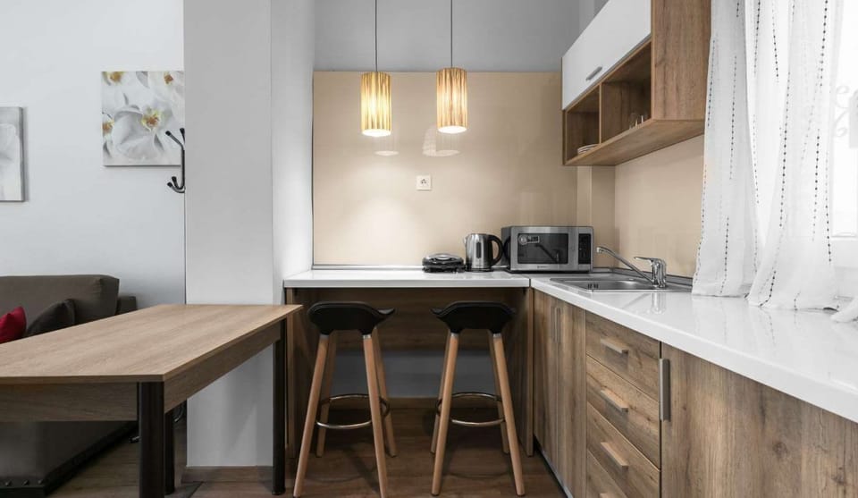 City Apartment | Private kitchen | Full-size fridge, oven, coffee/tea maker, cookware/dishes/utensils