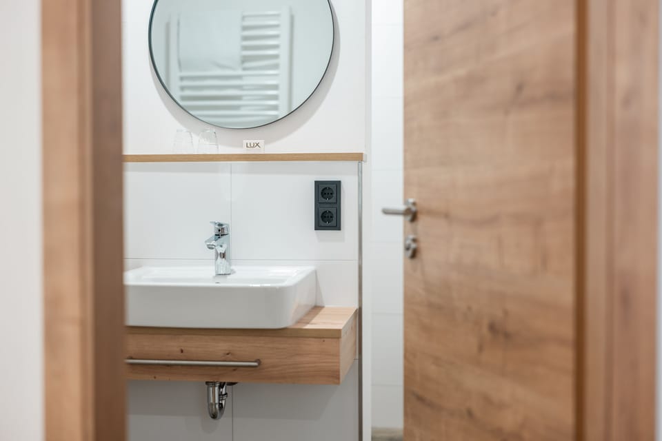 Shower, eco-friendly toiletries, hair dryer, towels