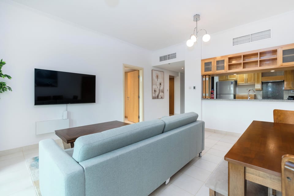 Comfort Apartment | Living area | Flat-screen TV