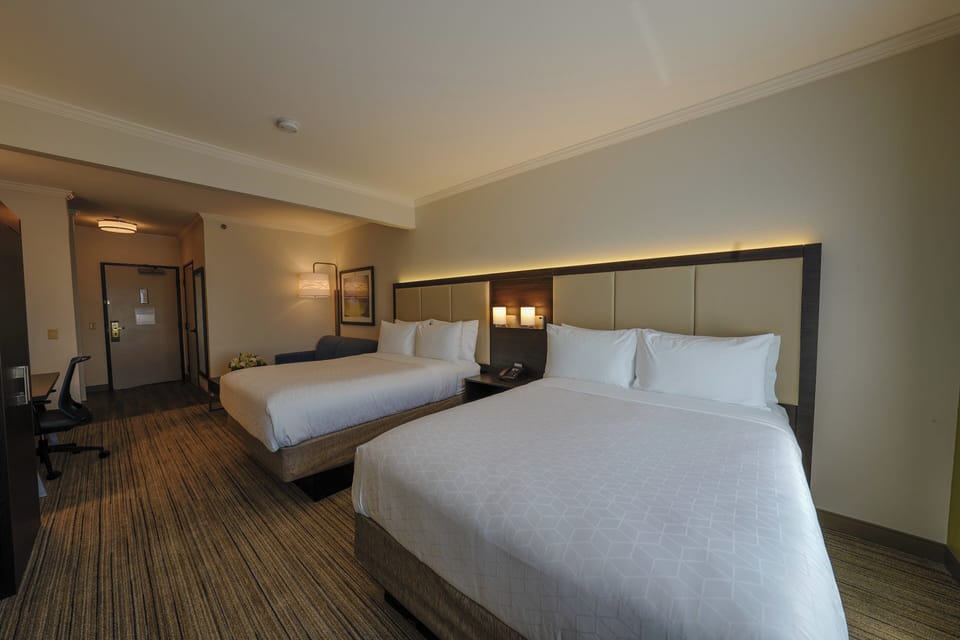 Suite, 2 Queen Beds | In-room safe, desk, laptop workspace, iron/ironing board