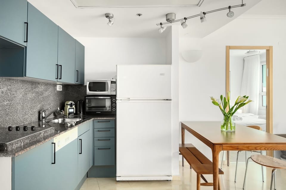 Apartment | Private kitchen | Full-size fridge, microwave, oven, stovetop