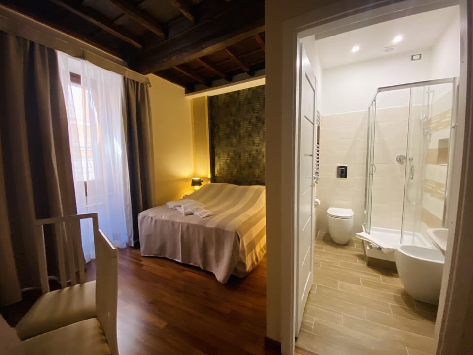 Premium bedding, down comforters, minibar, in-room safe