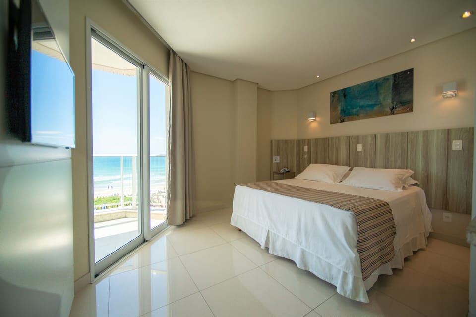 Superior Room, Ocean View | Minibar, in-room safe, desk, blackout drapes