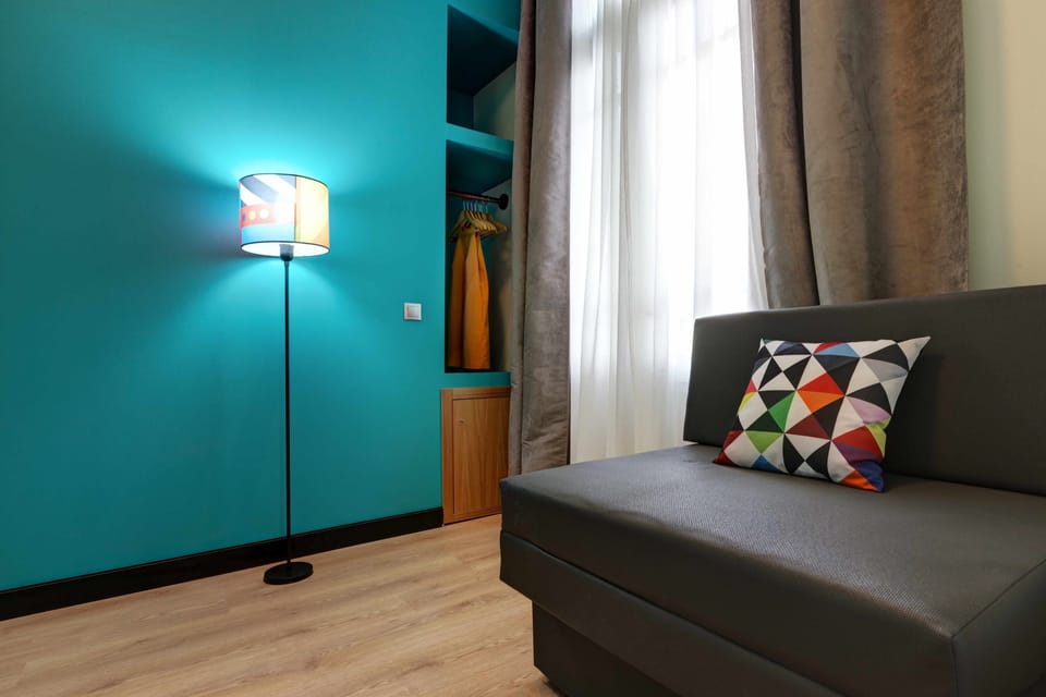 Deluxe Room, 1 Bedroom, Sea Facing (Corner Deluxe ) | Living area | 32-inch LED TV with digital channels, TV, MP3 dock