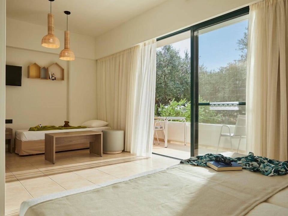 Apartment, 1 Bedroom, Garden View (sliding door) | Desk, blackout drapes, free cribs/infant beds, travel crib