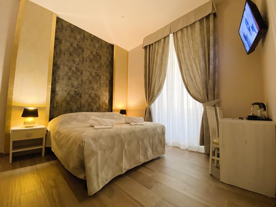 Hypo-allergenic bedding available, minibar, in-room safe, desk